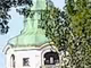 the tower behind the trees, converted JPEG XL file, zoomed in 4x