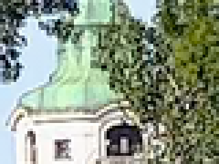 the tower behind the trees, original JPEG XL file, zoomed in 4x